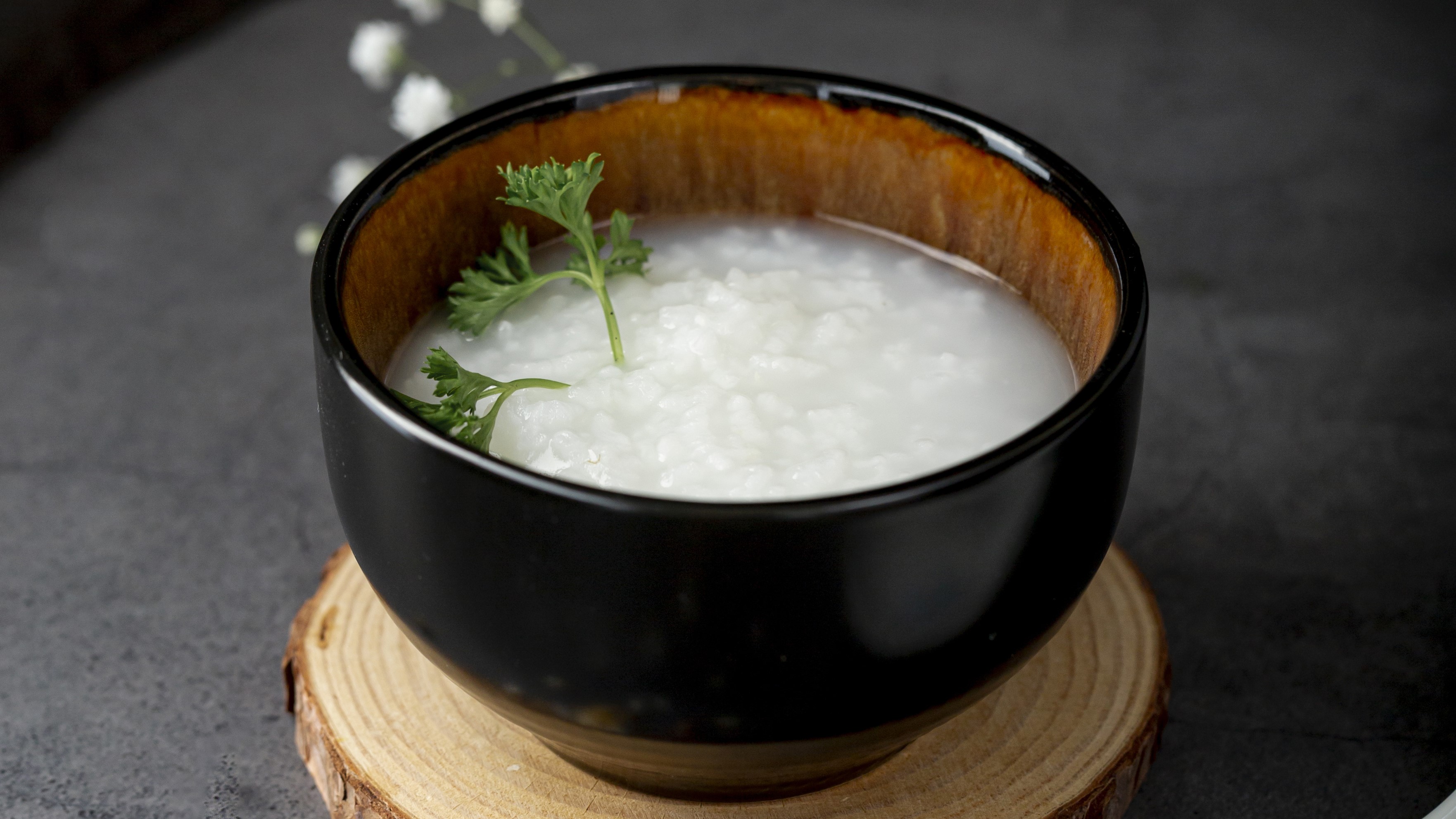 black-bowl-with-rice-soup-wooden-support.jpg black-bowl-with-rice-soup-wooden-support.jpg