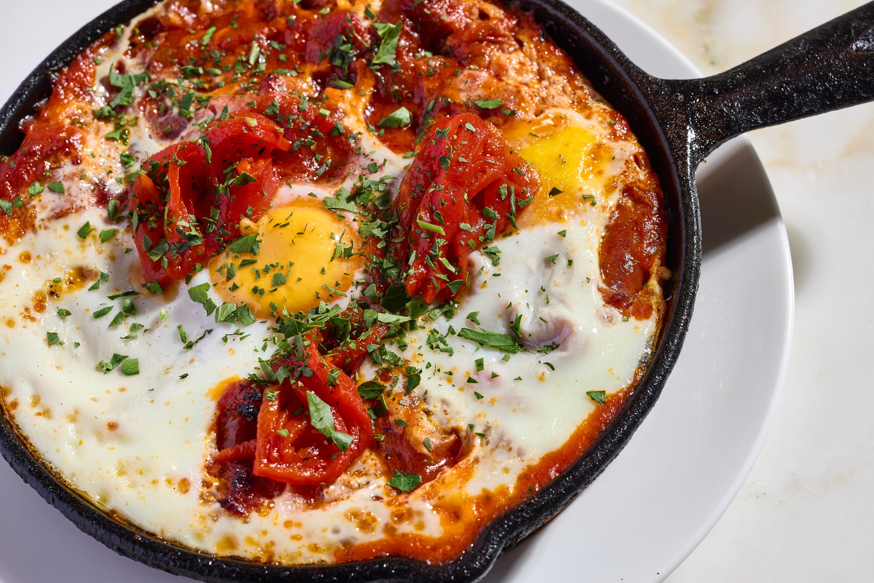 Low-res Qué Pasa Brunch – Eggs Flamenco (Chistorra Sausage, Tomatoes, Peppers) 1.jpg