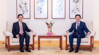 周霽會見李家超-將依法履責-全力支援服務香港實現更好發展