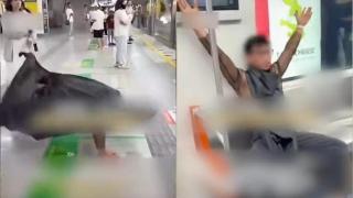 有片-杭州一男子着黑絲爬進地鐵車廂引乘客尖叫跑開-警方正調查