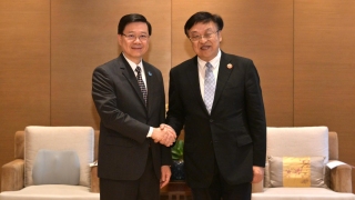 李家超與海南省委書記馮飛會面-稱瓊港可優勢互補強強聯手
