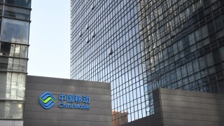 業績速遞-中移動去年純利跌0-9--派息增3-5