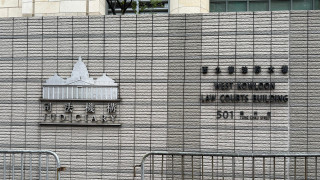 疑掛住玩手機將兩少主關入狗籠-印傭被控兩罪保釋候訊